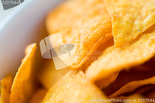 Image of close up of corn crisps or nachos in bowl