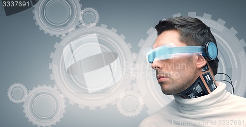 Image of man with futuristic glasses and sensors