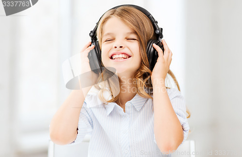 Image of girl with headphones listening to music