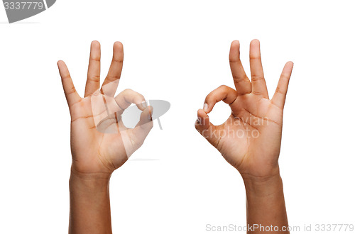 Image of woman hands showing ok sign