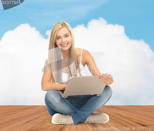 Image of happy student girl with laptop computer