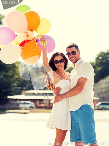 Image of smiling couple in city