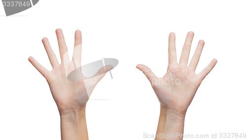 Image of two woman hands waving hands