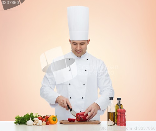 Image of happy male chef cook cooking food