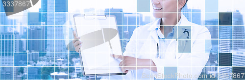 Image of happy african female doctor with clipboard