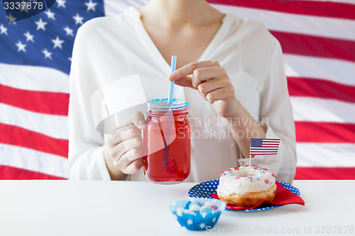 Image of woman celebrating american independence day