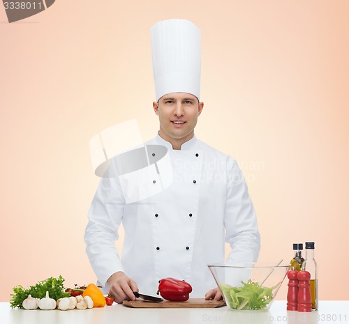 Image of happy male chef cook cooking food