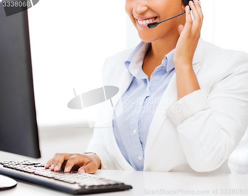 Image of african female helpline operator