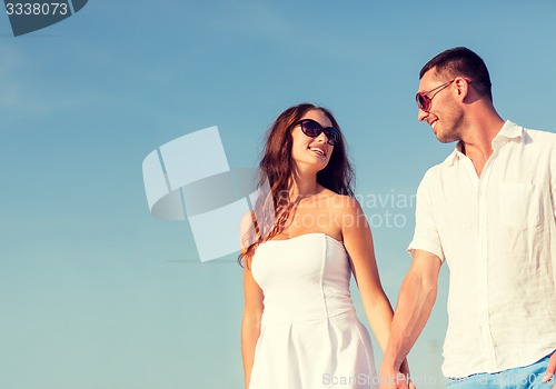 Image of smiling couple in city