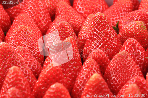 Image of red strawberries texture as background