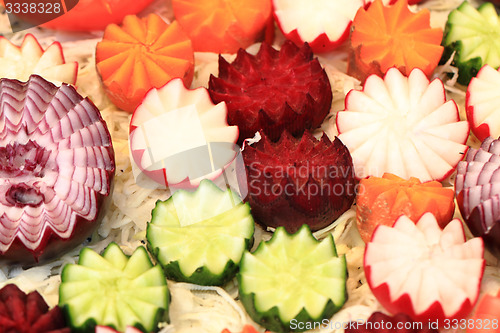 Image of vegetable decoration from cucumber, carrot