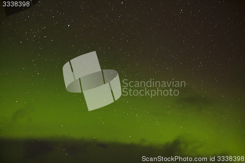 Image of Northern lights with bright stars in Iceland