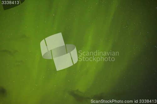 Image of Northern lights with bright stars in Iceland