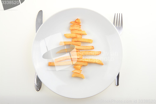 Image of christmas tree from fried potatoes 