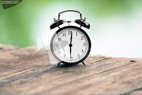 Image of Vintage background with retro alarm clock