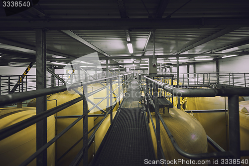 Image of Industrial interior with welded silos