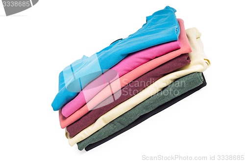 Image of A pile of folded T shirts