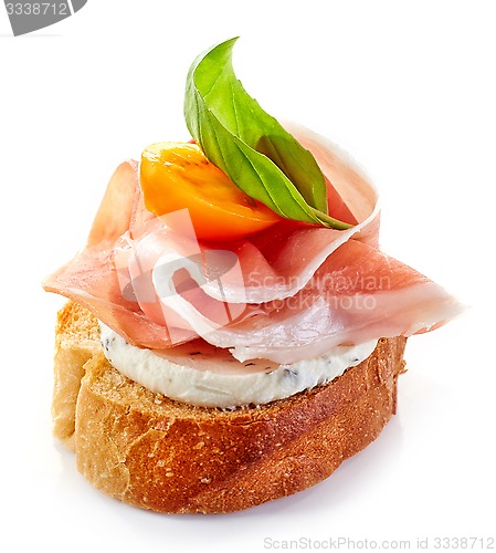 Image of toasted bread slice with smoked ham