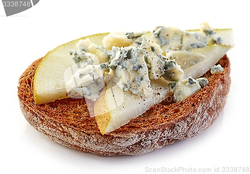 Image of toasted bread slice with pear and blue cheese
