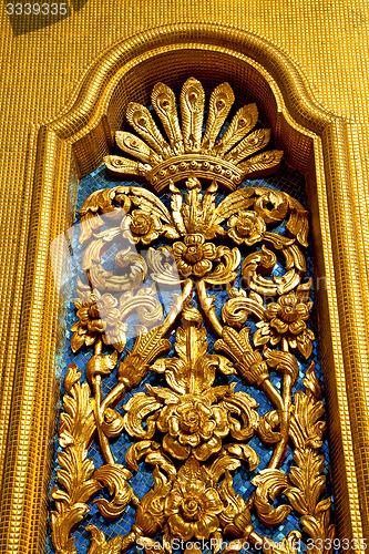 Image of window   in  gold    temple    bangkok  flower