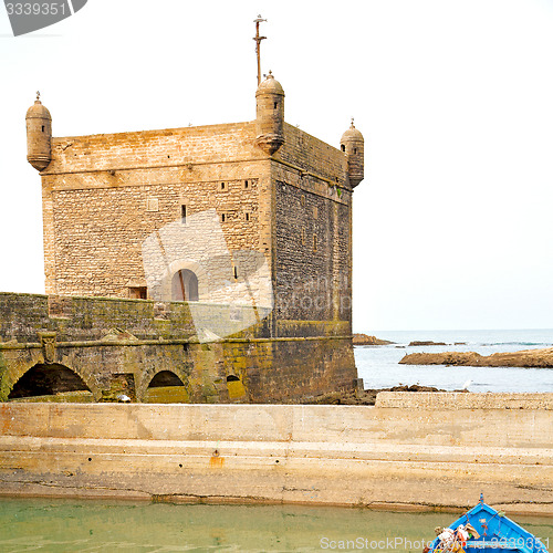 Image of   boat and sea in africa morocco old castle brown brick  sky