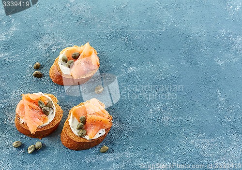Image of toasted bread with cream cheese and salmon