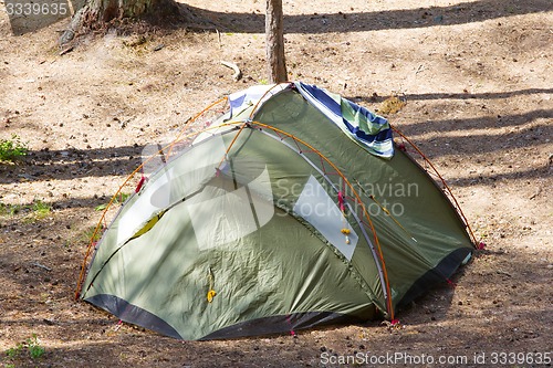 Image of camping outdoor with  tent in woods in summer 