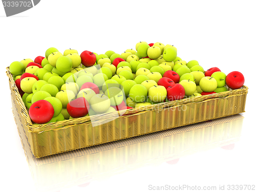 Image of Wicker basket full of apples isolated on white
