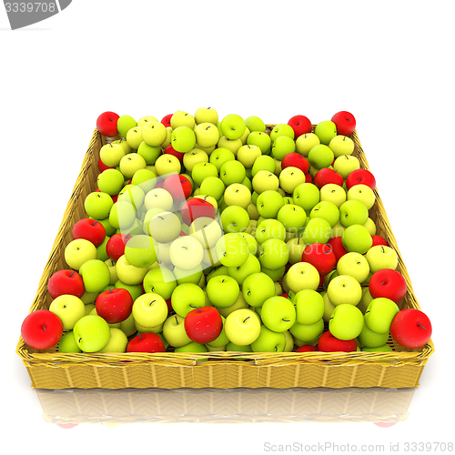Image of Wicker basket full of apples isolated on white