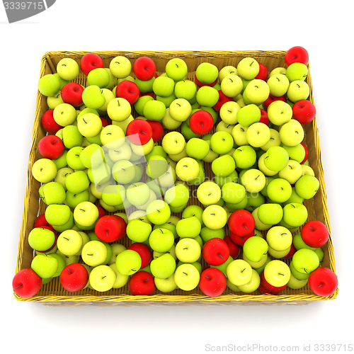Image of Wicker basket full of apples isolated on white