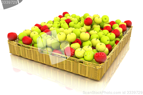 Image of Wicker basket full of apples isolated on white