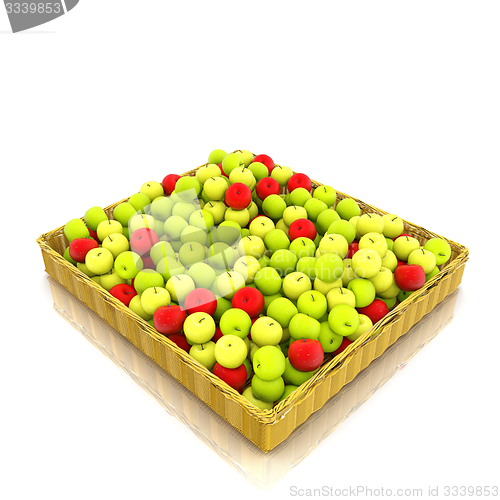 Image of Wicker basket full of apples isolated on white