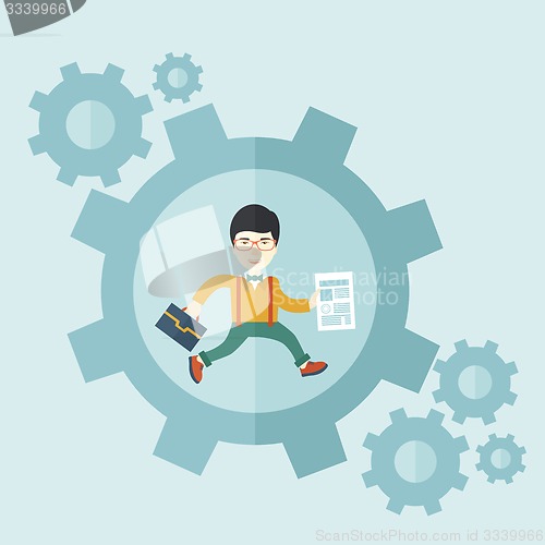 Image of Man carrying a bag and paper as his business proposal inside the big gear.