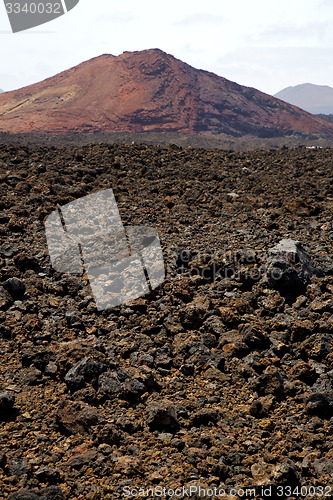 Image of volcanic stone in los volcanes lanzarote   rock  sky  hill  summ