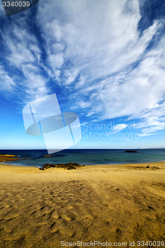 Image of footstep in lanzarote   cloud beach  water  and summer 