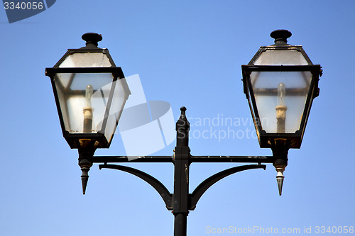 Image of  street lamp and a bulb in the sky arrecife