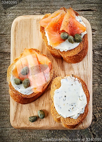 Image of toasted bread slices with cream cheese and smoked salmon