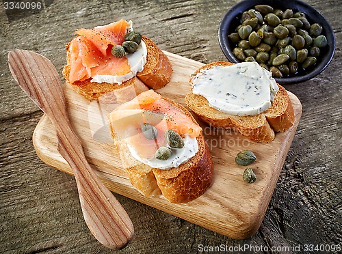 Image of toasted bread slices with cream cheese and smoked salmon