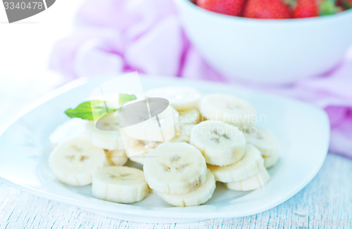 Image of banana with strawberry