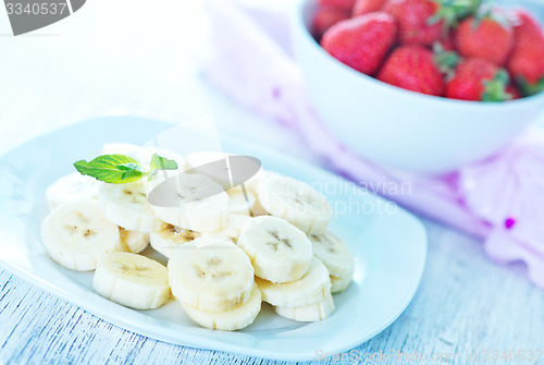 Image of banana with strawberry