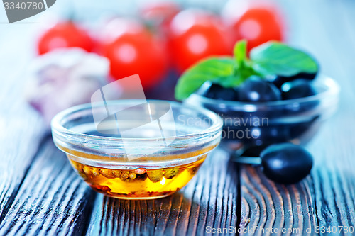 Image of olive and oil