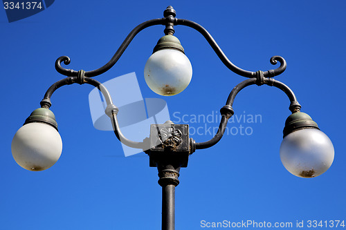 Image of street lamp a bulb in the   sky lugano Switzerland  