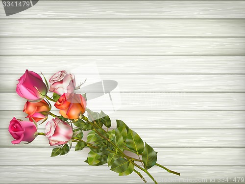 Image of Roses on wooden background. EPS 10