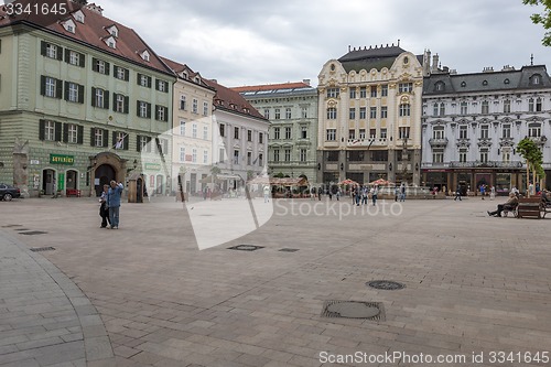 Image of BRATISLAVA, SLOVAKIA - MAY 07 2013: Tourists and residents on Main City Square in Old Town 