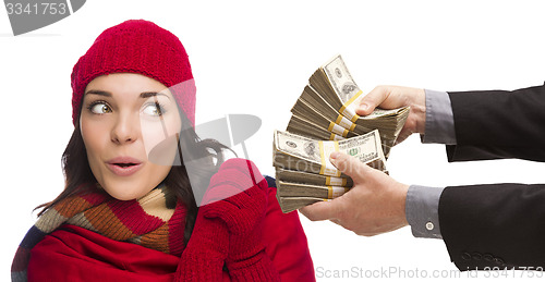 Image of Mixed Race Young Woman Being Handed Thousands of Dollars