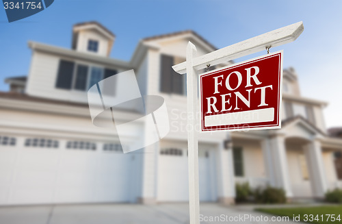 Image of For Rent Real Estate Sign in Front of House