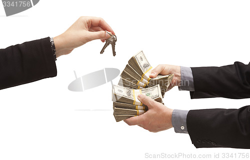 Image of Handing Over Thousands of Dollars for House Keys on White