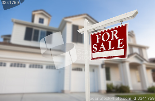 Image of Home For Sale Sign in Front of New House