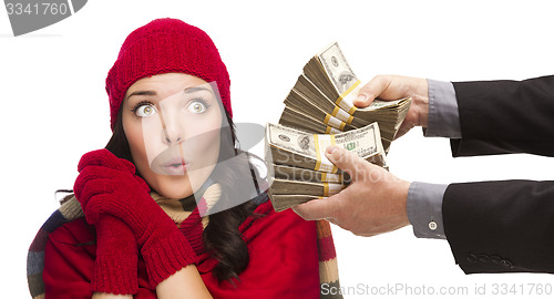 Image of Mixed Race Young Woman Being Handed Thousands of Dollars
