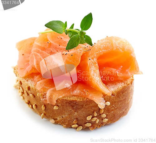 Image of bread with fresh salmon fillet